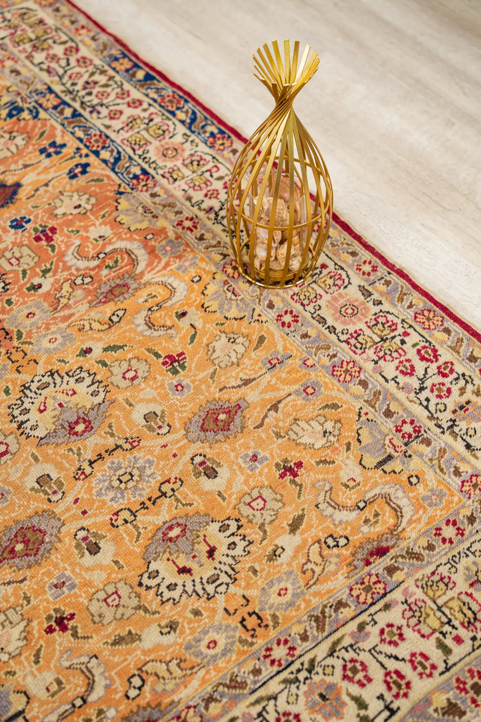 Weathered antique rug with visible age and patina